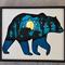 large bear with cubs and lights